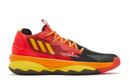 Red, black, and yellow athletic shoe on a white background