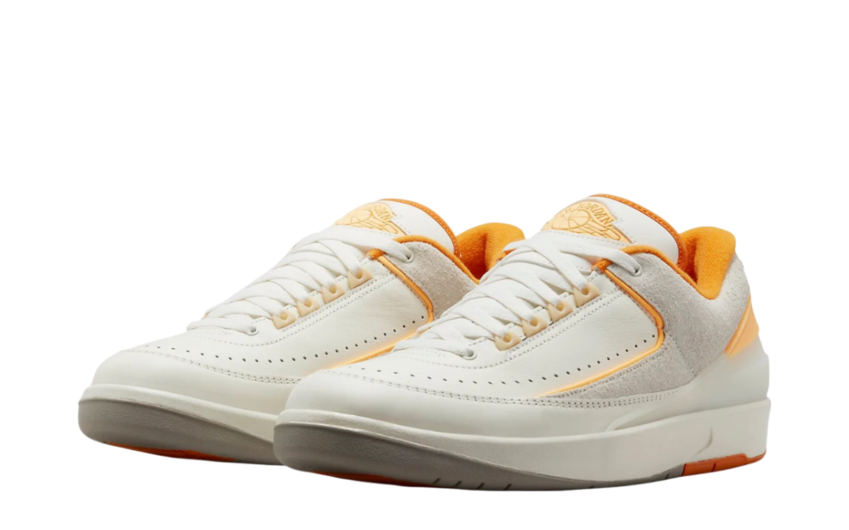 Air Jordan 2 Retro Low Craft Melon Tint shoes highlighting smooth leather upper and retro silhouette.