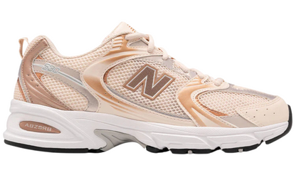 New Balance 530 White Pink lifestyle shoes – classic retro design with mesh and leather upper for everyday comfort.