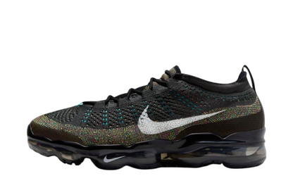 Black Nike shoe with multicolor mesh design.