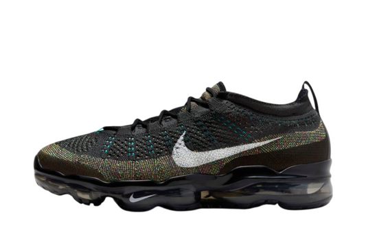 Black Nike shoe with multicolor mesh design.
