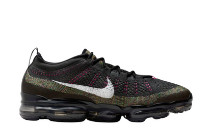Side view of Nike Air Vapormax 2023 Flyknit shoes showing colorful Flyknit upper and transparent Air sole.