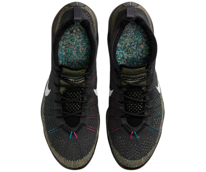 Nike Air Vapormax 2023 Flyknit shoes highlighting woven pattern and lace details.