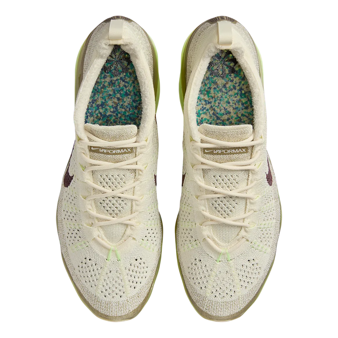 White sneakers with speckled lining on a white background