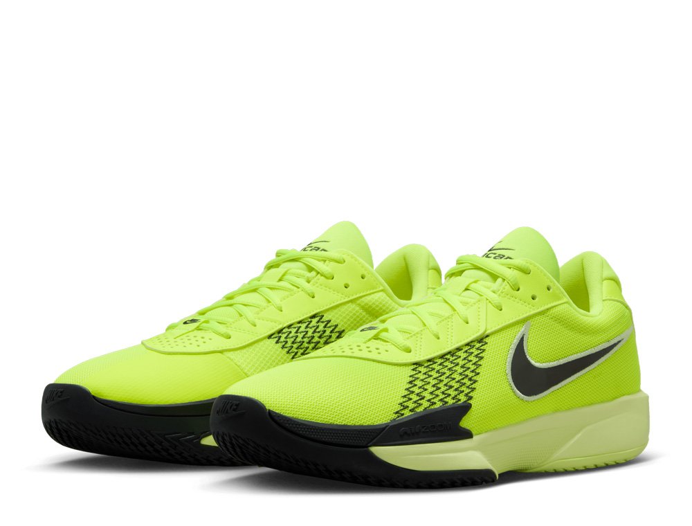 Nike GT Cut Academy Volt basketball shoes showing sleek profile and durable upper for court movement.