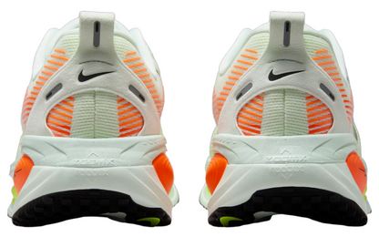 Nike Vomero 18 running shoes highlighting breathable mesh upper and secure lacing system.